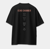 Back of black oversized T-shirt featuring ECHO CHAMBER text about repetition, questions and belief