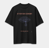 Black oversized T-shirt featuring ATTENTION ECONOMY eye graphic surrounded by digital information