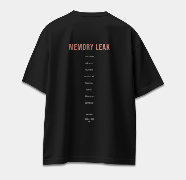 Back of black oversized T-shirt featuring MEMORY LEAK text about machines, memory and meaning